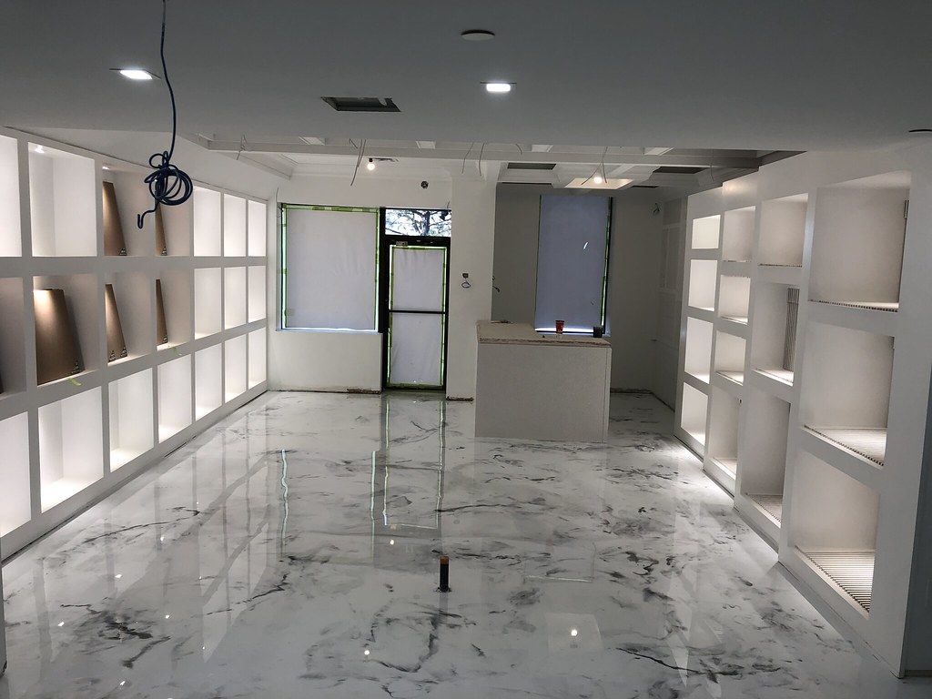Commercial metallic epoxy flooring for Cedar Rapids retail and showroom spaces